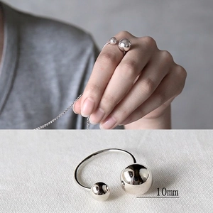 Minimalist S925 sterling silver open ring featuring 10mm polished spheres on finger