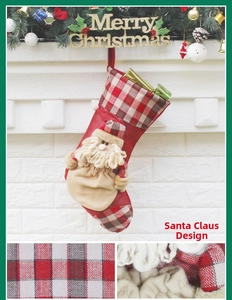 Detail of red and white plaid Christmas stocking featuring a 3D Santa Claus plush doll