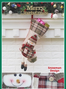 Detailed view of burlap Christmas stocking featuring a 3D snowman with plaid details