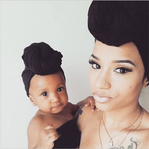 Fashionable black knotted turban hats for mother and baby in premium soft fabric