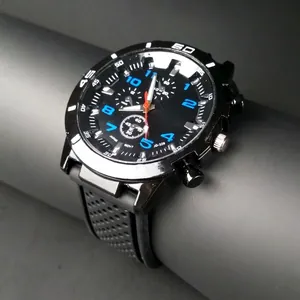 Men's sports watch with black silicone strap and blue markers in a car-inspired design