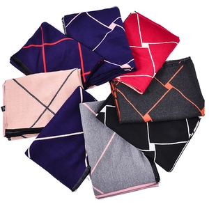 Classic checkered thick winter scarf with geometric pattern in multiple colors and soft texture