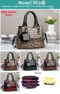 Detail view of leopard print handbag A7243 showing 30x22x13cm dimensions and inner pockets
