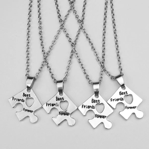 Set of four stainless steel puzzle heart necklaces with Best Friends Forever engraving
