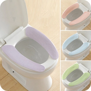 Adhesive suede toilet seat pads in purple, pink, blue, and green for universal toilets