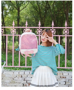 Close-up of pink bow and transparent PVC display window on a Japanese ita backpack