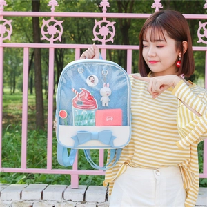 Cute blue and white ITA bag with a transparent window and large bow for students