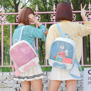 Japanese style ita backpack with clear window and bow knot detail in pink and blue colors