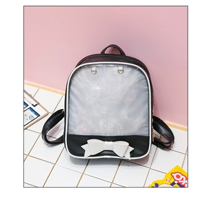 Close-up of Japanese style ita bag featuring a clear PVC window and white bow detail