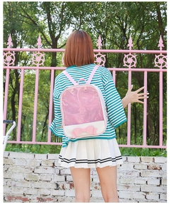 Pink Ita bag with transparent glitter window and large bow detail for pin display