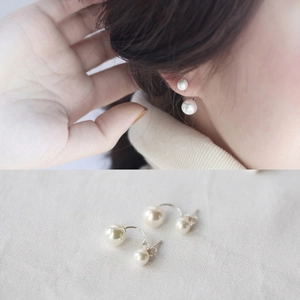 Elegant S925 silver double pearl earrings featuring a minimalist curved U-shape design