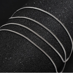 Elegant 925 sterling silver curb chain necklace shown on a professional jewelry display