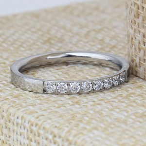 Elegant 18K silver stainless steel half eternity ring with 9 clear inset diamonds