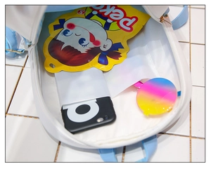 Top-down view of the spacious white Japanese ita bag interior with light blue straps