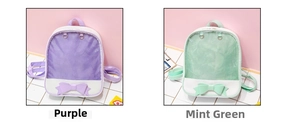 Detail view of purple and mint green ita bags with clear windows and bow decor
