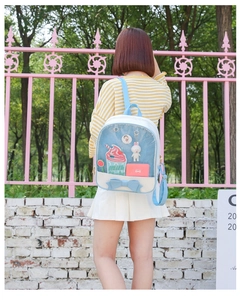 Detail of light blue Japanese ita bag with transparent window and bow for display