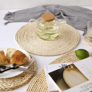 Natural corn husk woven round placemats for heat resistant dining table protection