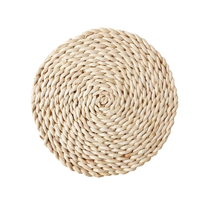 Natural handmade corn husk woven round table mat with rustic heat-resistant texture
