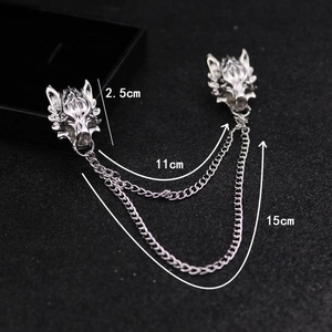 Detailed view of silver wolf head brooch showing 11cm and 15cm metal chain dimensions