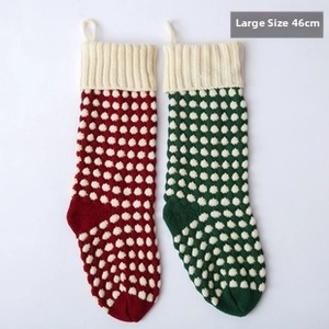 Close-up of knit Christmas stockings with white polka dots, 46cm large size stockings