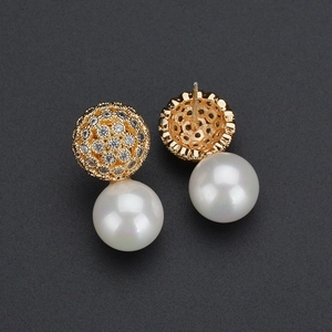Elegant gold pearl stud earrings with sparkling cubic zirconia pavé detailing for women