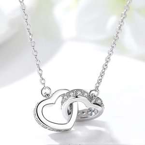 Elegant S925 sterling silver interlocking heart necklace with sparkling pavé zircons