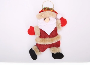 Detail of Santa Claus ornament with burlap texture and gold hanging string
