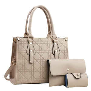 Three-piece beige faux leather tote bag set with geometric embossed patterns and golden hardware