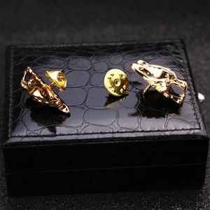 Golden alloy leopard head brooch with long chain fringe on black leather gift box