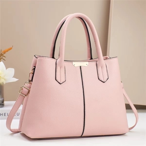 Pink lychee grain leather tote bag with gold metal plate and adjustable strap
