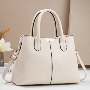 Chic beige lychee leather tote bag with gold hardware and detachable shoulder strap