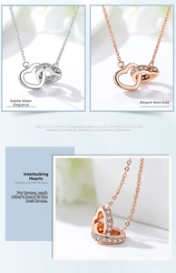 Detail of interlocking double hearts necklace in silver and rose gold with pavé crystals