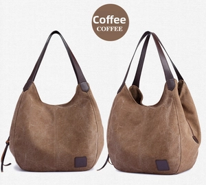 Front and side view of large coffee canvas hobo tote bag with leather straps and base