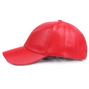 Side view of red faux leather baseball cap with a glossy finish and classic 6-panel design