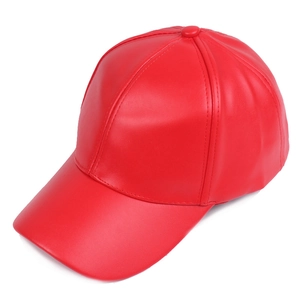 Detail view of red faux leather baseball cap showing stitching and grainy texture