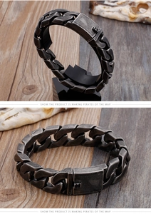 Detail of vintage matte grey stainless steel cuban chain bracelet with clasp closure