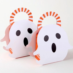 Ghost-shaped Halloween candy boxes with orange inner gift bags and striped handles