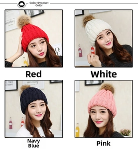 Detail showing knit beanie hats in four colors with faux fur pom pom decoration