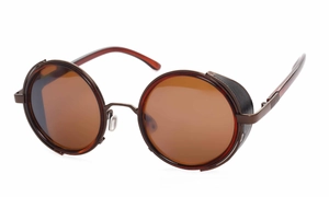 Macro view of vintage steampunk sunglasses with round brown lenses and leather side shields
