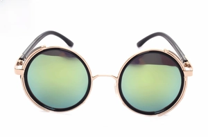 Detail of round punk steampunk sunglasses with golden reflective lenses and gold metal frame