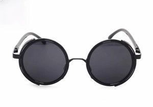 Detail shot of punk retro round sunglasses with black frame, side shields and grey lenses