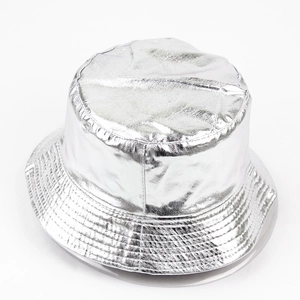 Macro detail of metallic silver bucket hat showing reflective coating and parallel stitching