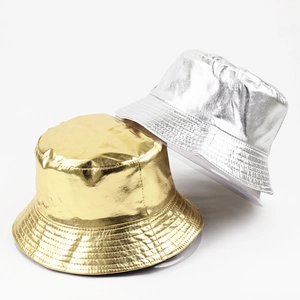 Shiny gold and silver reversible patent leather bucket hats with metallic finish