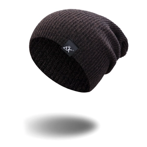 Brown ribbed knit beanie with AX brand label, classic slouchy fit for outdoor winter wear