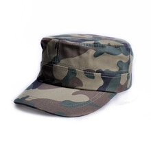 Detailed side view of vintage washed forest camouflage flat top military style cap