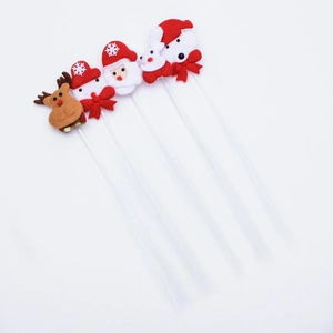 Detail of four Christmas headbands with Reindeer, Snowman, Santa and Polar Bear motifs