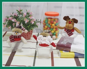 Three-piece Christmas star candy jars featuring snowman, Santa, and reindeer dolls