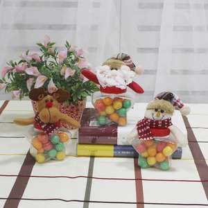 Christmas star-shaped clear candy jars featuring Santa, elk, and snowman cloth doll lids