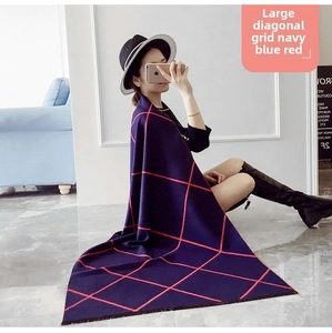 Close-up of navy blue and red double-sided grid scarf with thick cashmere texture