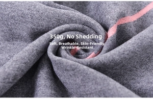 Detail of 350g soft grey cashmere-like scarf with pink stripes and smooth texture